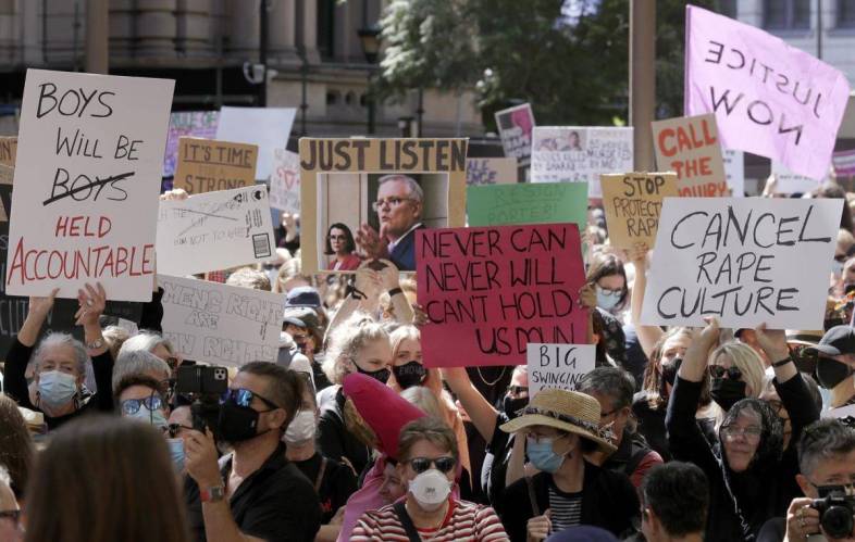 Australians rally at Parliament to demand justice for women
