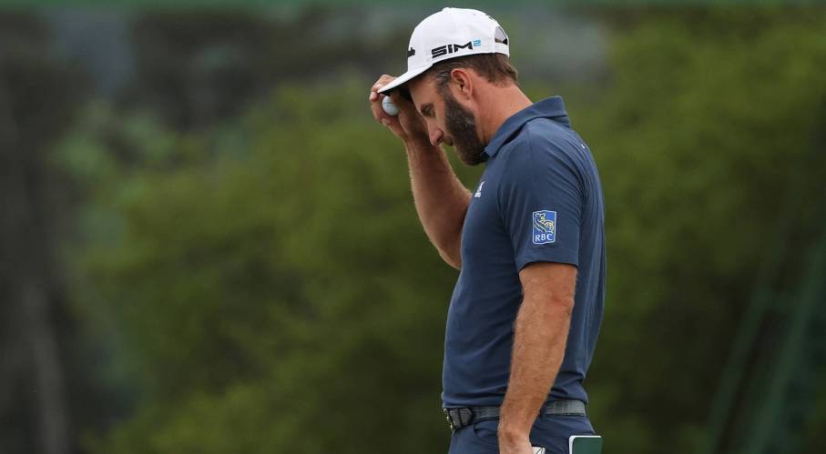 Dustin Johnson blames poor putting for a missed cut at Augusta