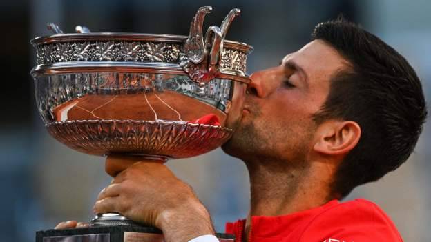 Novak Djokovic outlasts Stefanos Tsitsipas at French Open to win 19th major