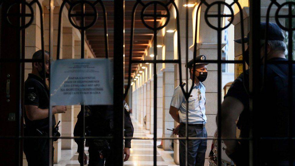 Greek Orthodox Priest Arrested In Athens Following Acid Attack On Seven Bishops