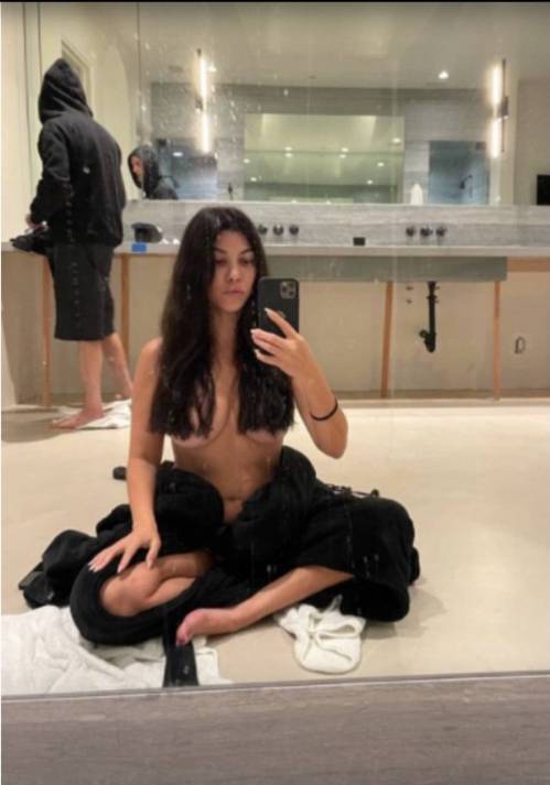 Kourtney Kardashian Goes Topless in Racy Pic After Travis Barker Cuts Her Hair