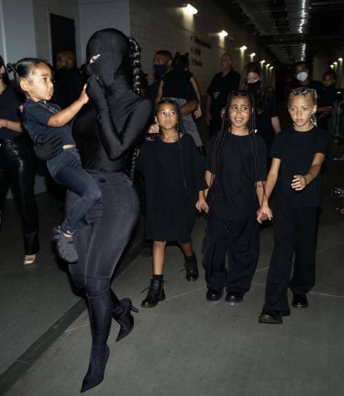 Kim Kardashian Turns Heads in Black Bondage-Style Suit While Supporting Ex Kanye West at Donda Event