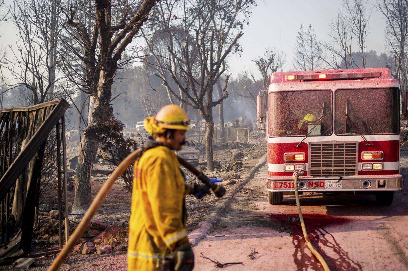 Many homes burn as California wildfire siege continues