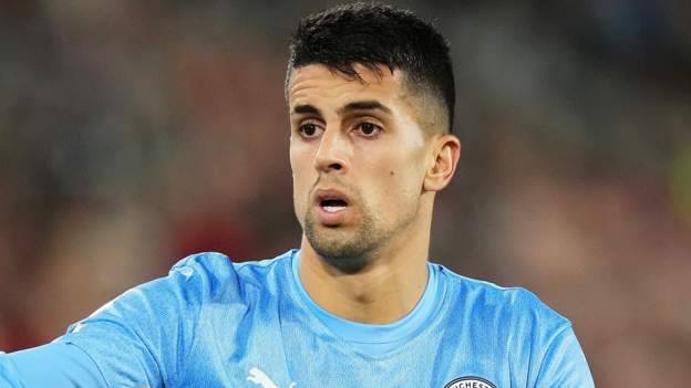 Manchester City Joao Cancelo full-back says he was injured in robbery