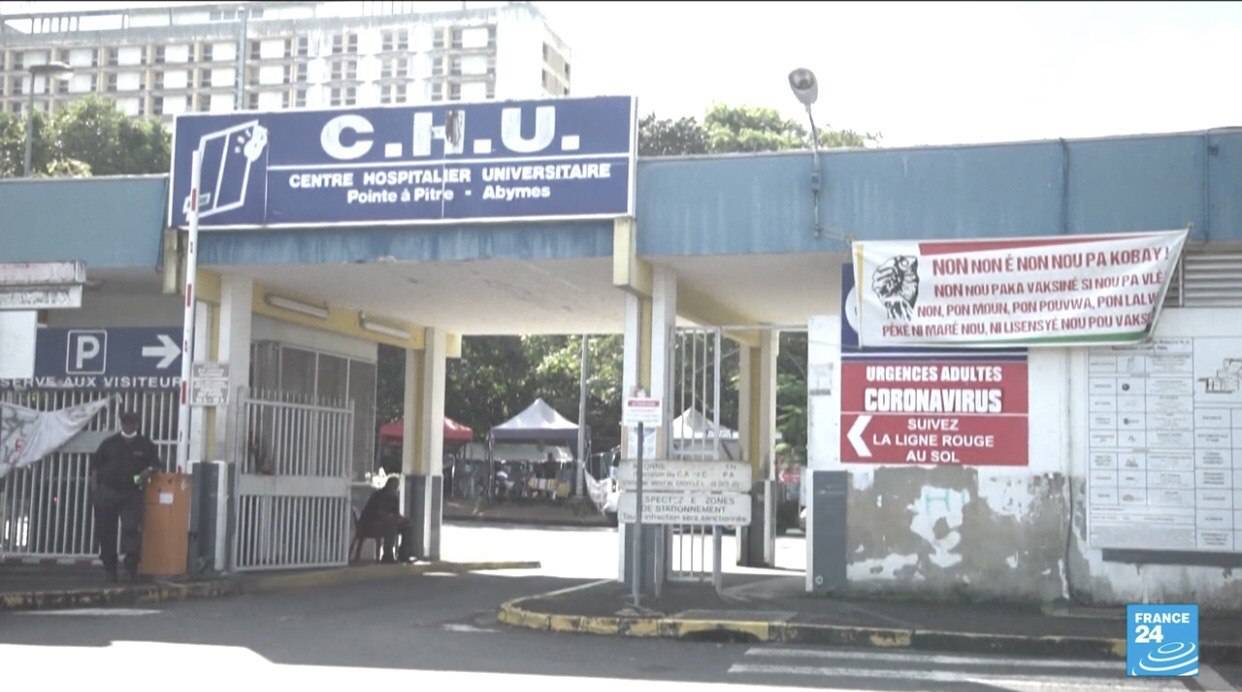 Guadeloupe anti-vaccine protesters attack top hospital staff
