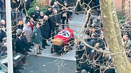 Jewish and Italian Catholic leaders condemn use of Nazi flag at church funeral