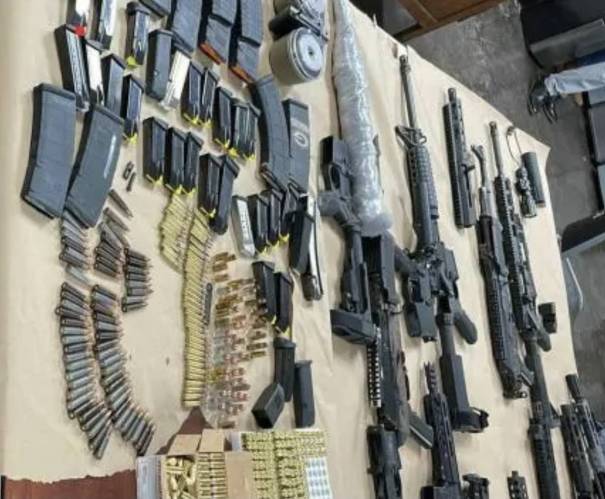 Trelawny woman charged in the seizure of 13 illegal firearms