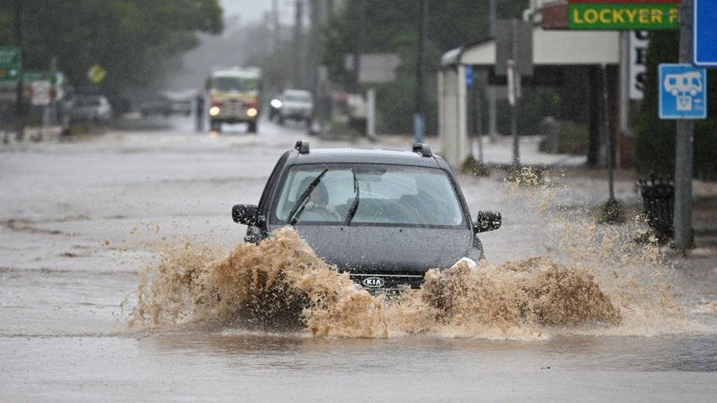 Australians have evacuated their homes as Queensland faces another flooding emergency