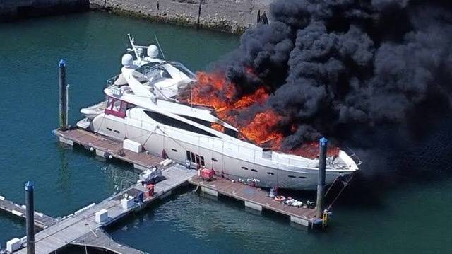 Super-yacht worth £6m sinks in Torquay harbour after large fire