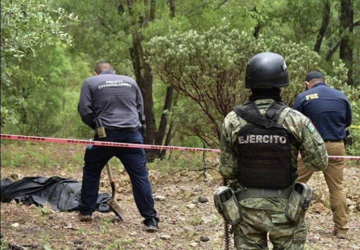 Mexican police find 23 bodies in pits near thermal springs