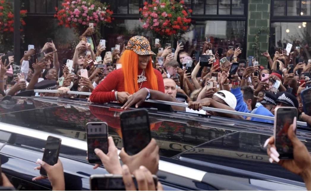 Nicki Minaj Is Bombarded by Fans in England, Pleads With Them to 'Get Into a Contained Space'