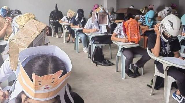 Student in Philippines 'anti-cheating' exam hats go viral