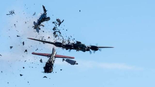 Two WW2 planes collide and crash in mid-air show at Dallas
