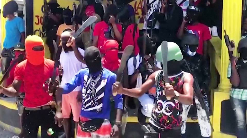 Haitian Police Blockade Port-au-Prince Streets After Gangs Kill 14 Officers