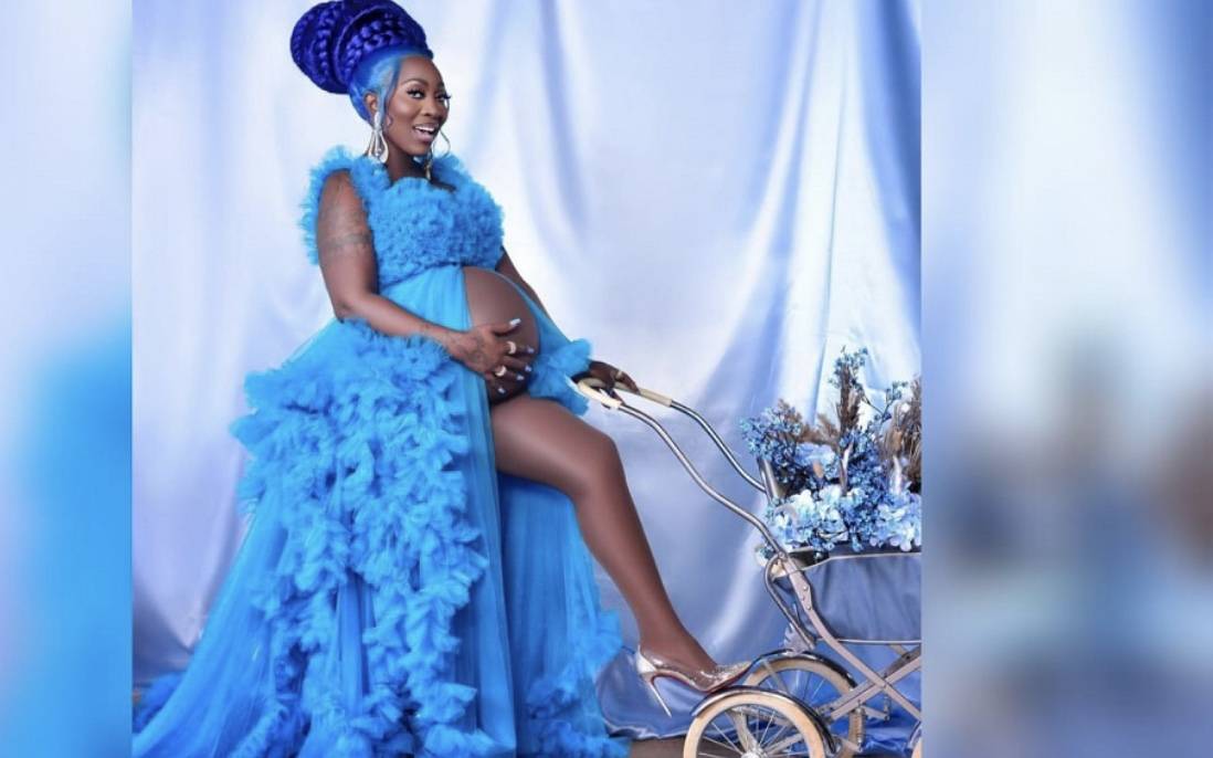 Spice sends tongues wagging with baby bump photo