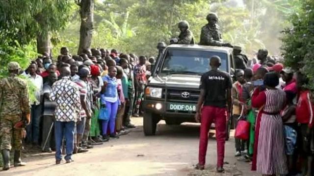 Dozens of pupils killed in Uganda school by militants linked to Islamic State group