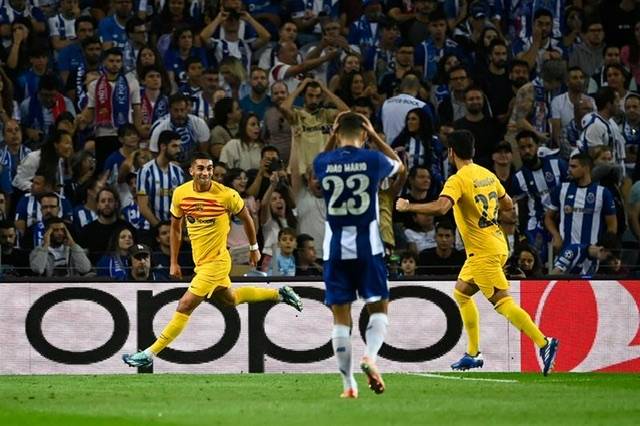 Torres gives Barcelona 1-0 victory at Porto