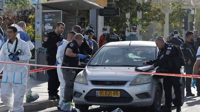 Two Palestinian gunmen killed Three Israelis in Jerusalem