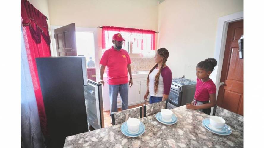 Guyana: Single mom receives new home for Christmas