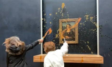 Protesters throw soup at the Mona Lisa da Vinci painting